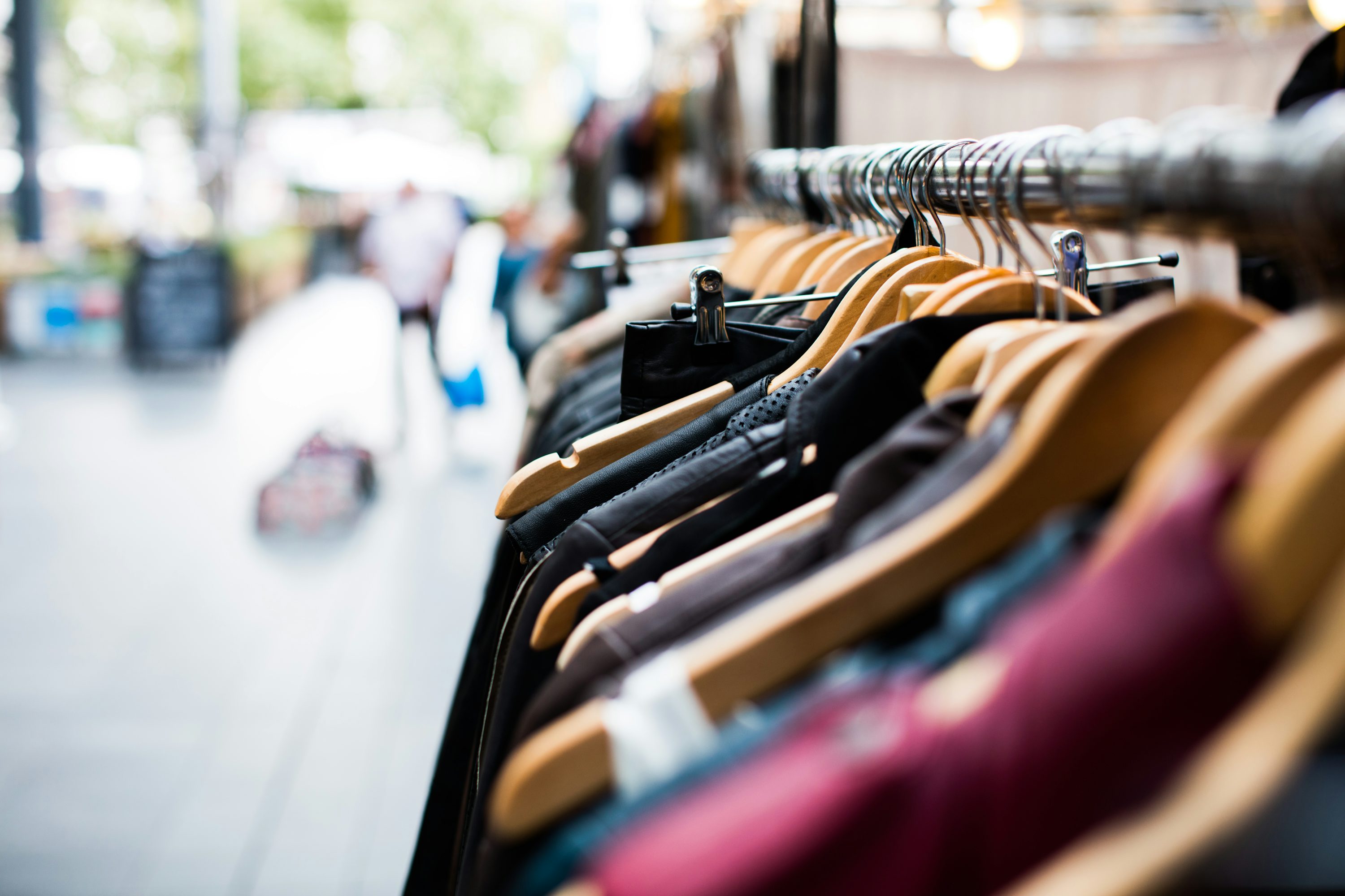 Clothing on hangers in a retail store